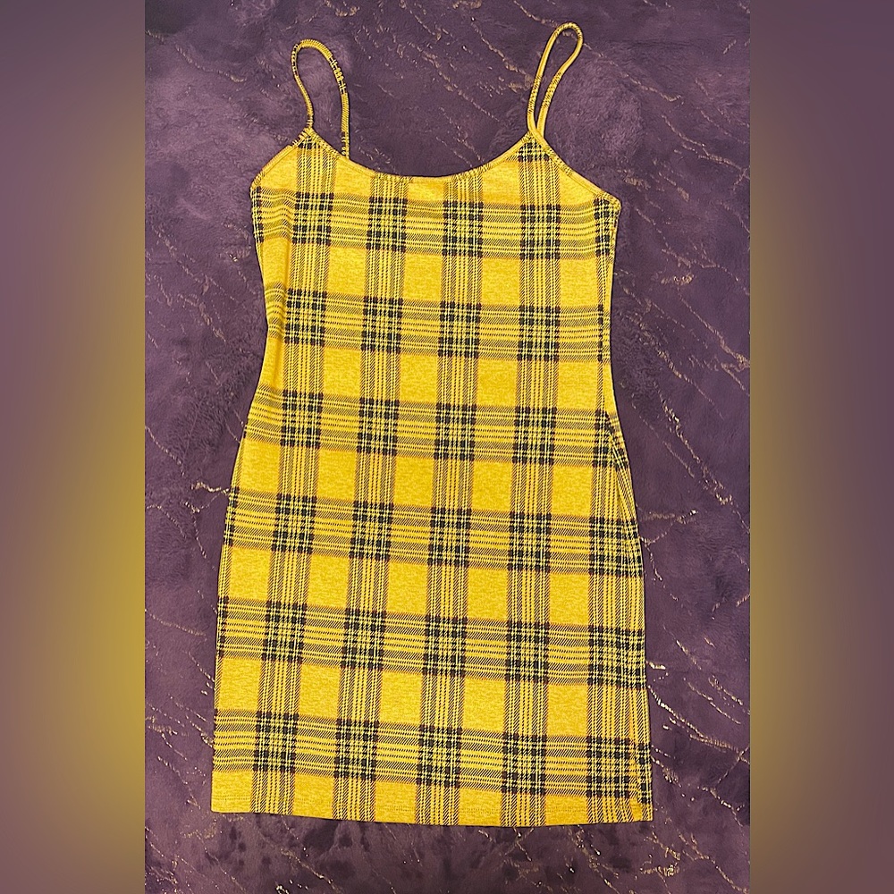 Yellow short suit black stripes